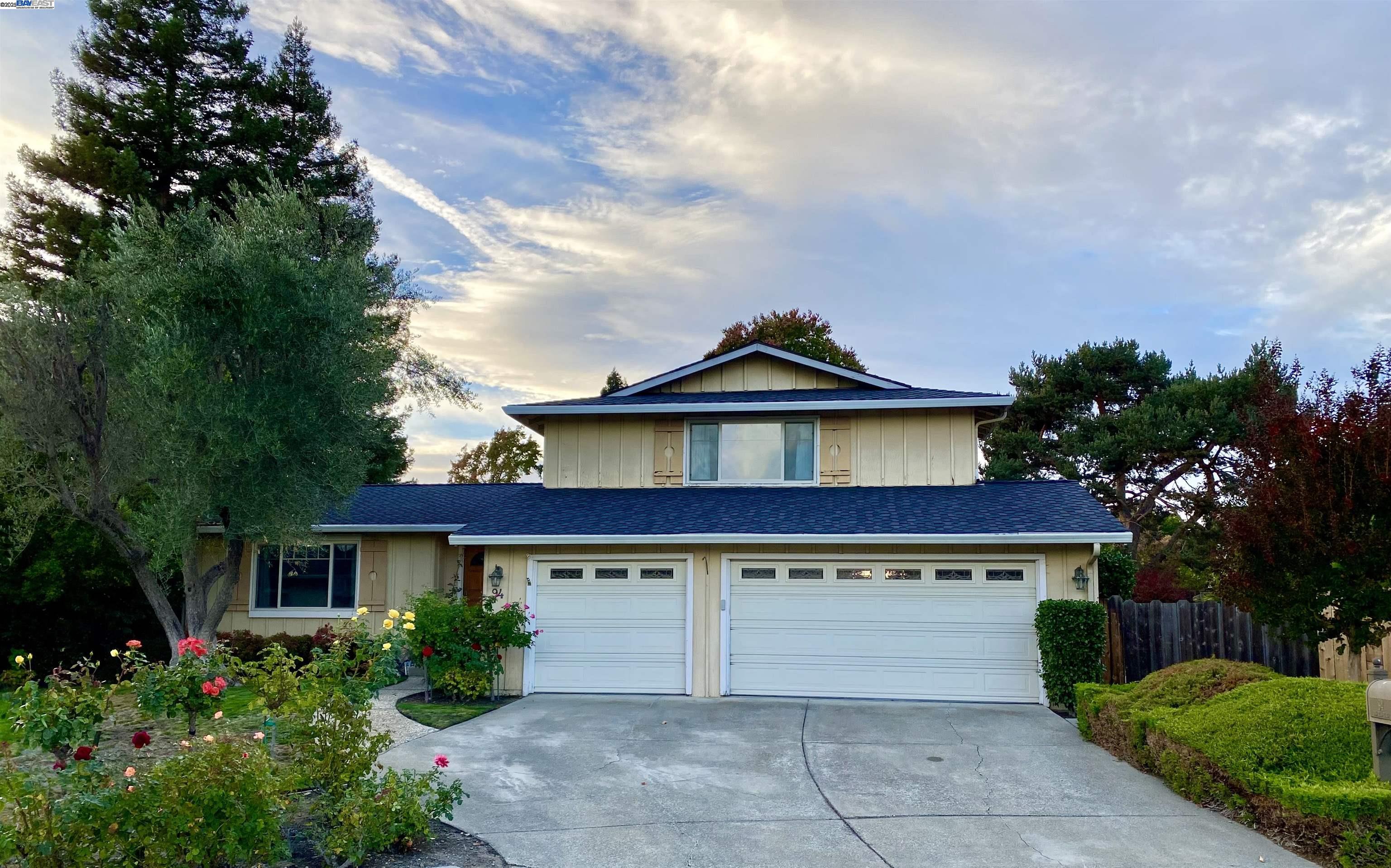 a front view of a house with yard