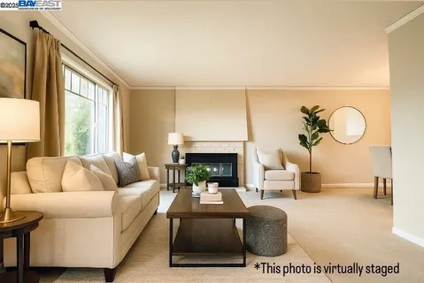 a kitchen with stainless steel appliances granite countertop wooden cabinets a sink and a window