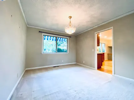wooden floor in a room with a window