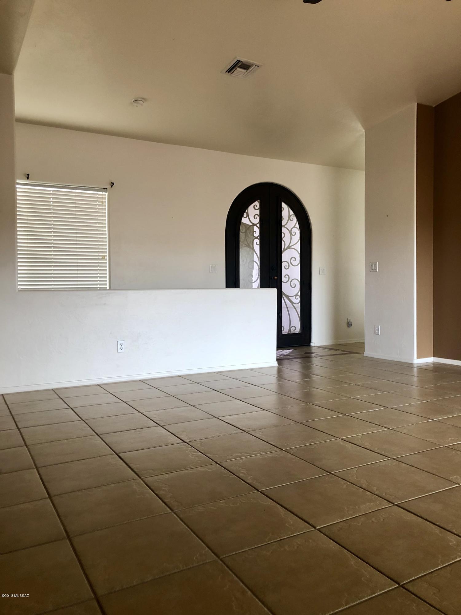 1435 Circulo Sombrero Rio Rico, AZ 85648 - Photo 8 of 40 a view of empty room with window
