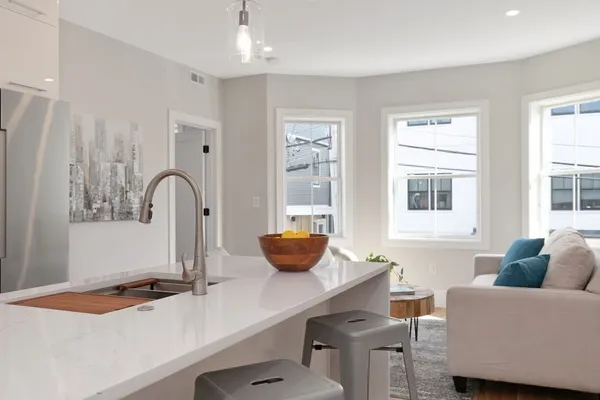 a living room with furniture and window