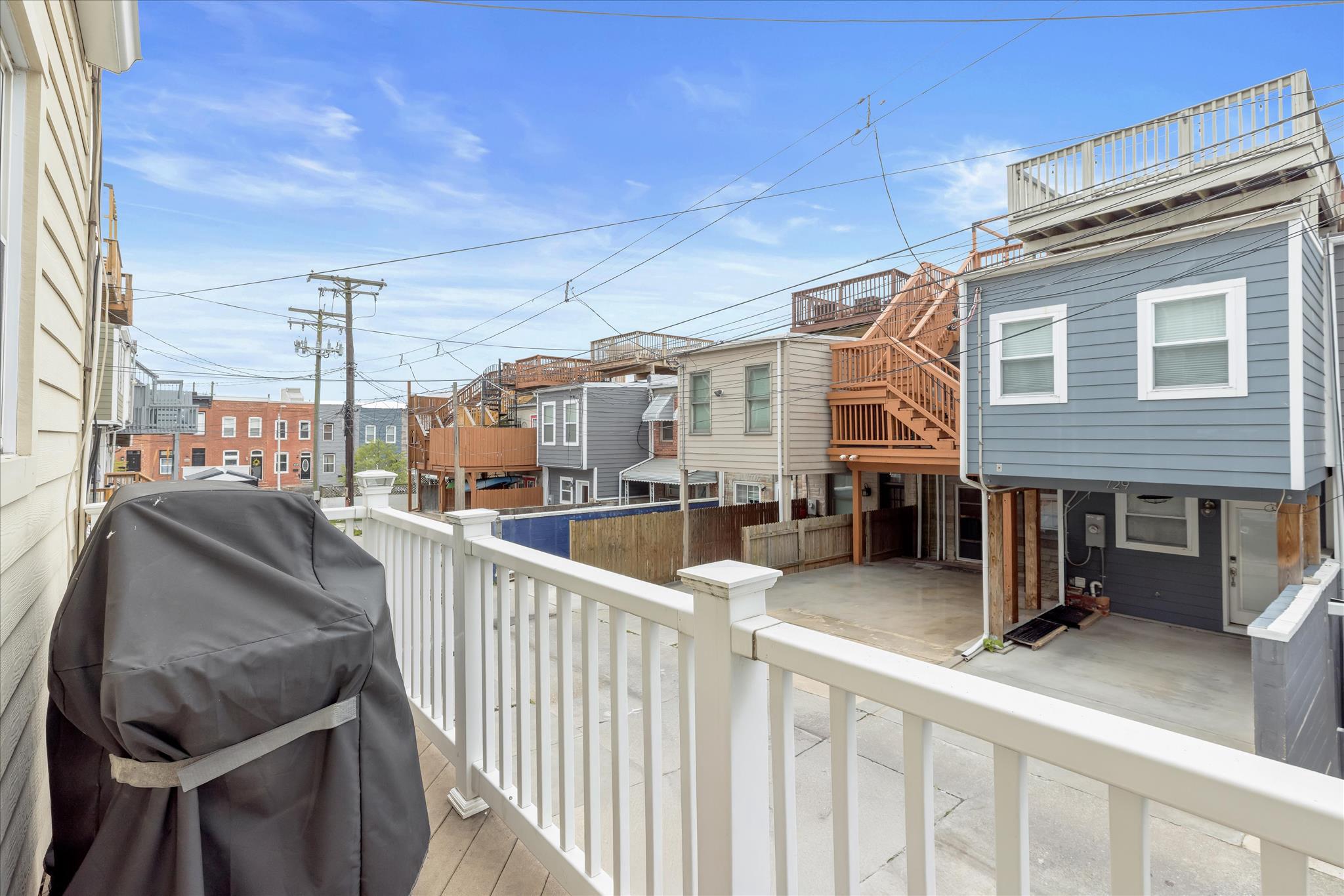724 South Potomac Street Baltimore, MD 21224 - Photo 18 of 48 Deck off Sitting Room Overlooking Parking Pad
