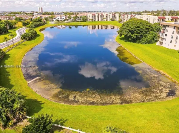 a view of swimming pool with outdoor seating