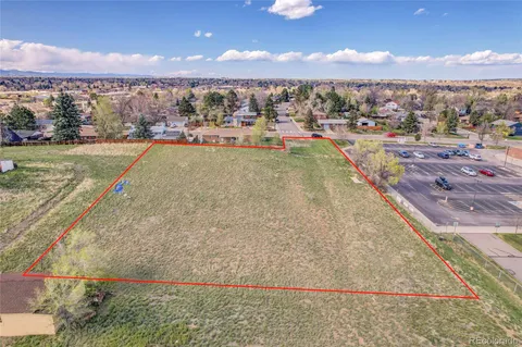 a view of a terrace with a garden and mountain view