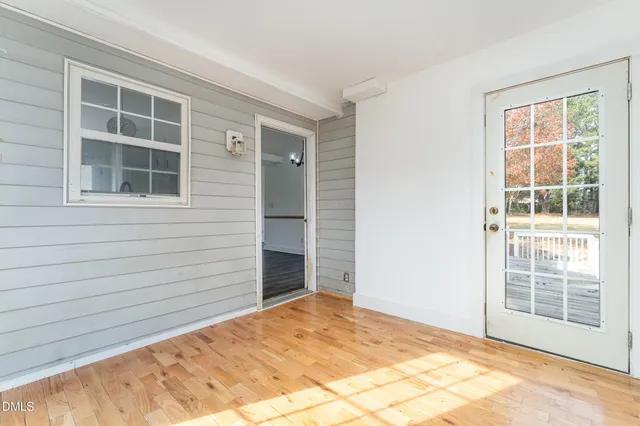 a view of empty room with windows