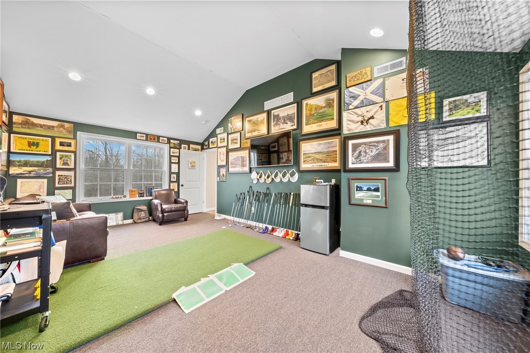 2840 Concord Road Cleveland, OH 44124 - Photo 26 of 35 Recreation room featuring vaulted ceiling and carpet flooring