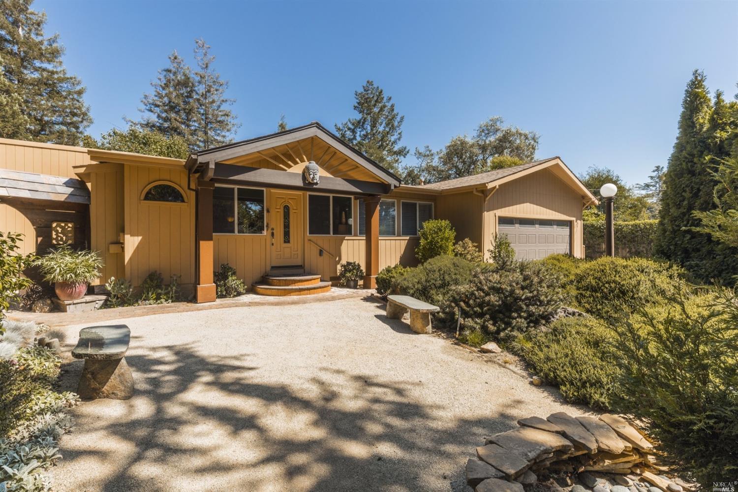 3445 Hicks Road Sebastopol, CA 95472 - Photo 1 of 1 a front view of a house with a yard and garage