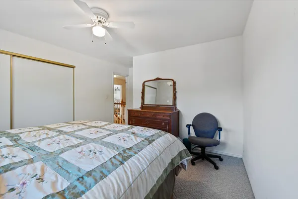 a view of a house with backyard and garden