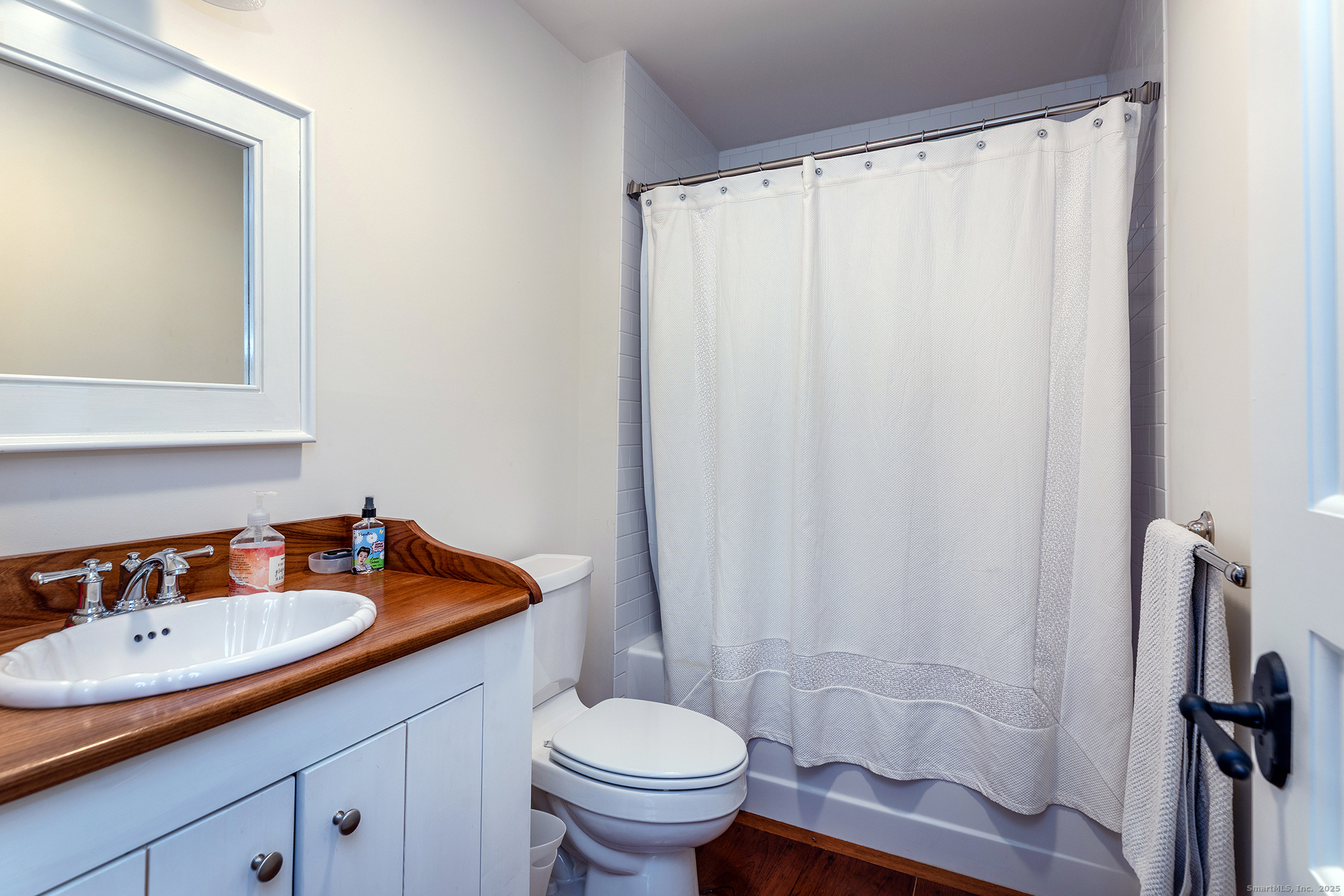109 Dibble Hill Road Cornwall, CT 06796 - Photo 18 of 23 a bathroom with a sink a toilet and a mirror