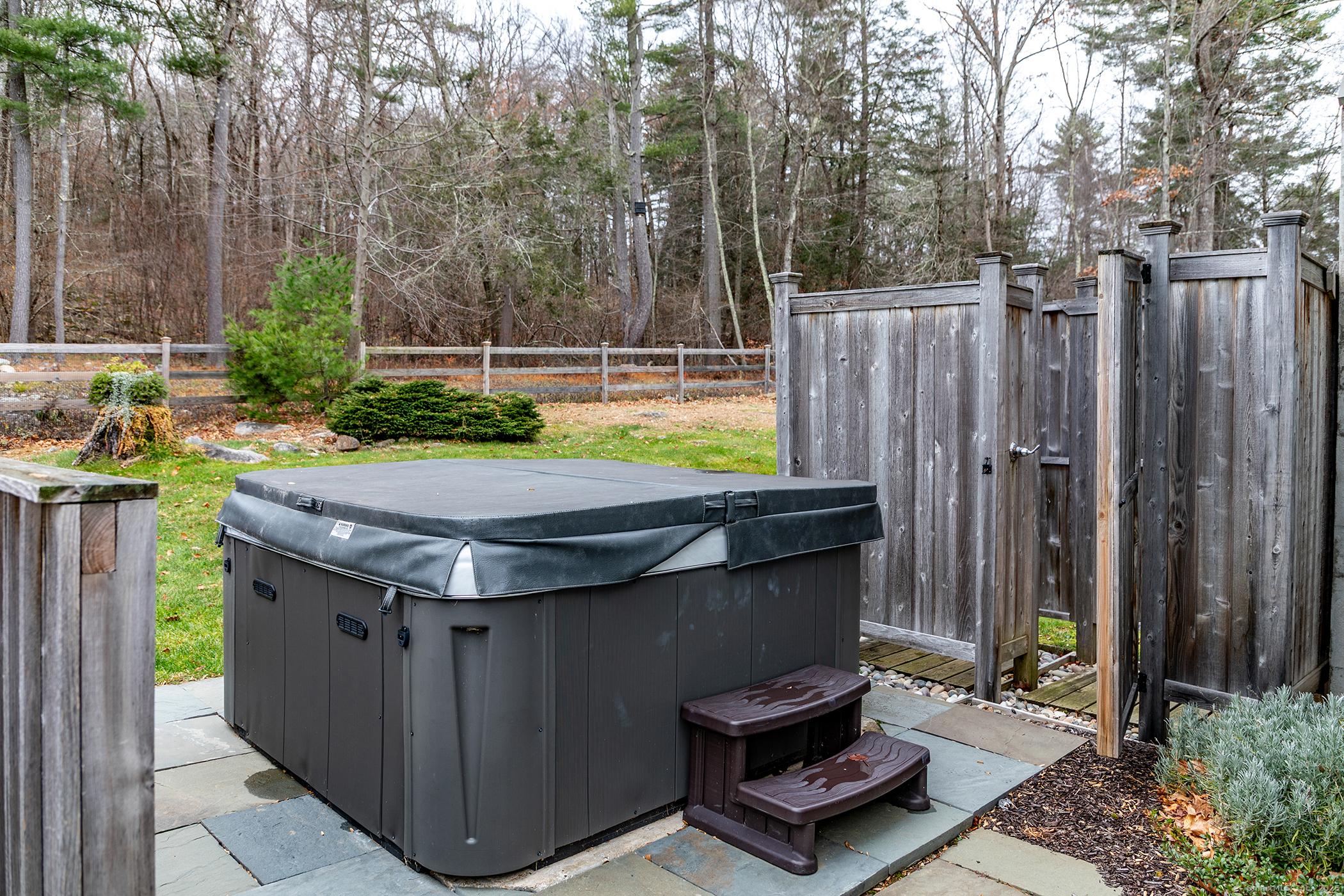 109 Dibble Hill Road Cornwall, CT 06796 - Photo 21 of 23 a view of a backyard with chairs and a small cabin