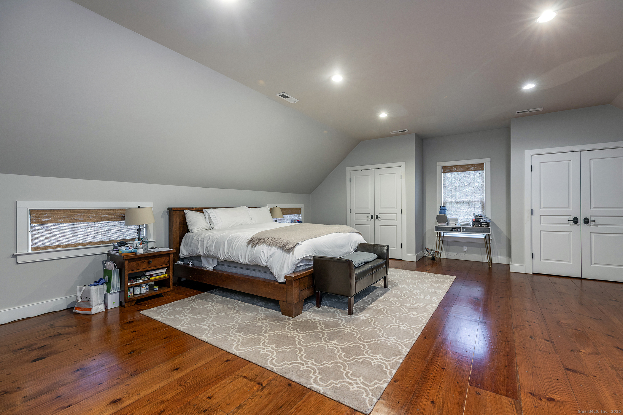 109 Dibble Hill Road Cornwall, CT 06796 - Photo 9 of 23 a spacious bedroom with a bed and wooden floor