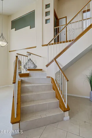 a view of a hallway with washer and dryer