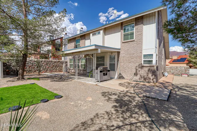 a view of a house with a patio