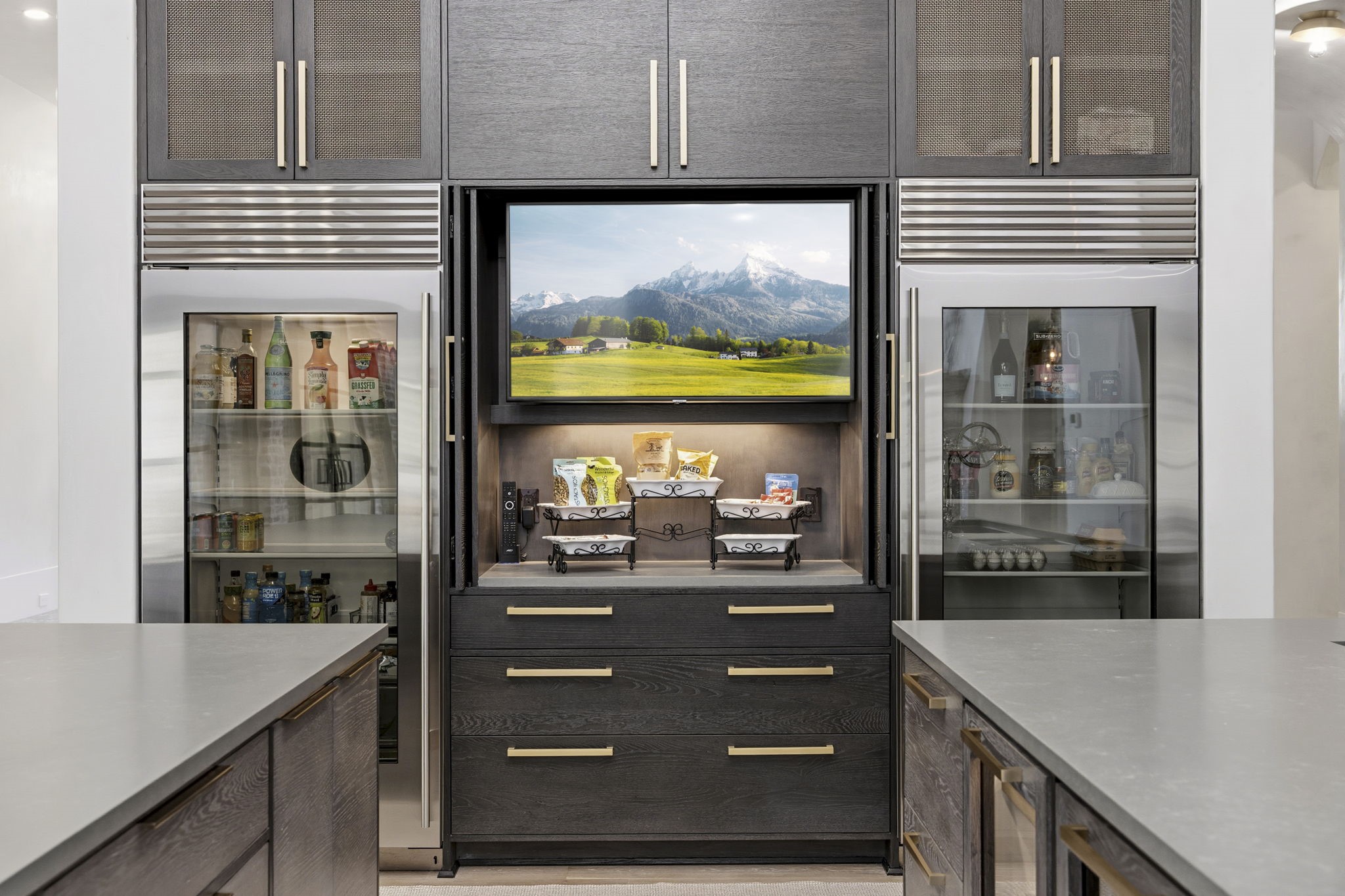 27006 Star Gazer Way Spring, TX 77386 - Photo 15 of 50 A premium appliance package includes two Sub-Zero glass-door refrigerators, two Sub-Zero beverage refrigerators, and a drawer-style refrigerator and freezer for effortless entertaining.