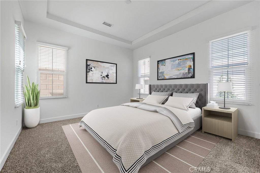 82 Meander Irvine, CA 92620 - Photo 12 of 32 a bedroom with a bed and painting on the wall