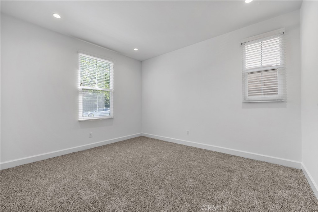 82 Meander Irvine, CA 92620 - Photo 15 of 32 an empty room with windows