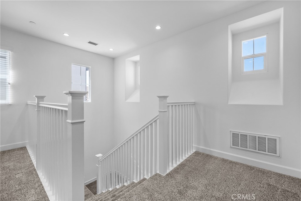 82 Meander Irvine, CA 92620 - Photo 18 of 32 a view of entryway with stairs