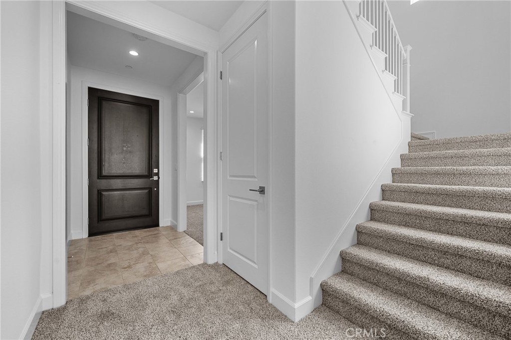 82 Meander Irvine, CA 92620 - Photo 2 of 32 a view of an entryway with wooden floor