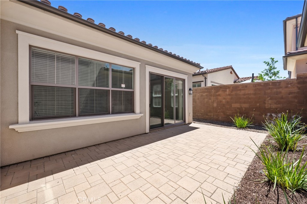 82 Meander Irvine, CA 92620 - Photo 26 of 32 a view of a house with a large window