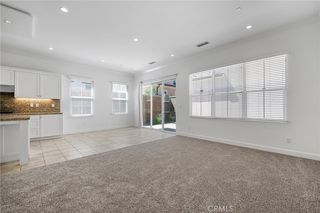 82 Meander Irvine, CA 92620 - Photo 6 of 32 a view of an empty room with a window