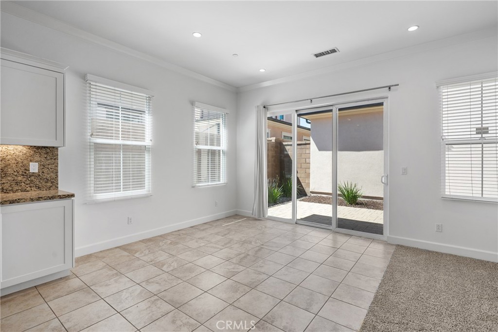 82 Meander Irvine, CA 92620 - Photo 10 of 32 a view of an empty room with a window