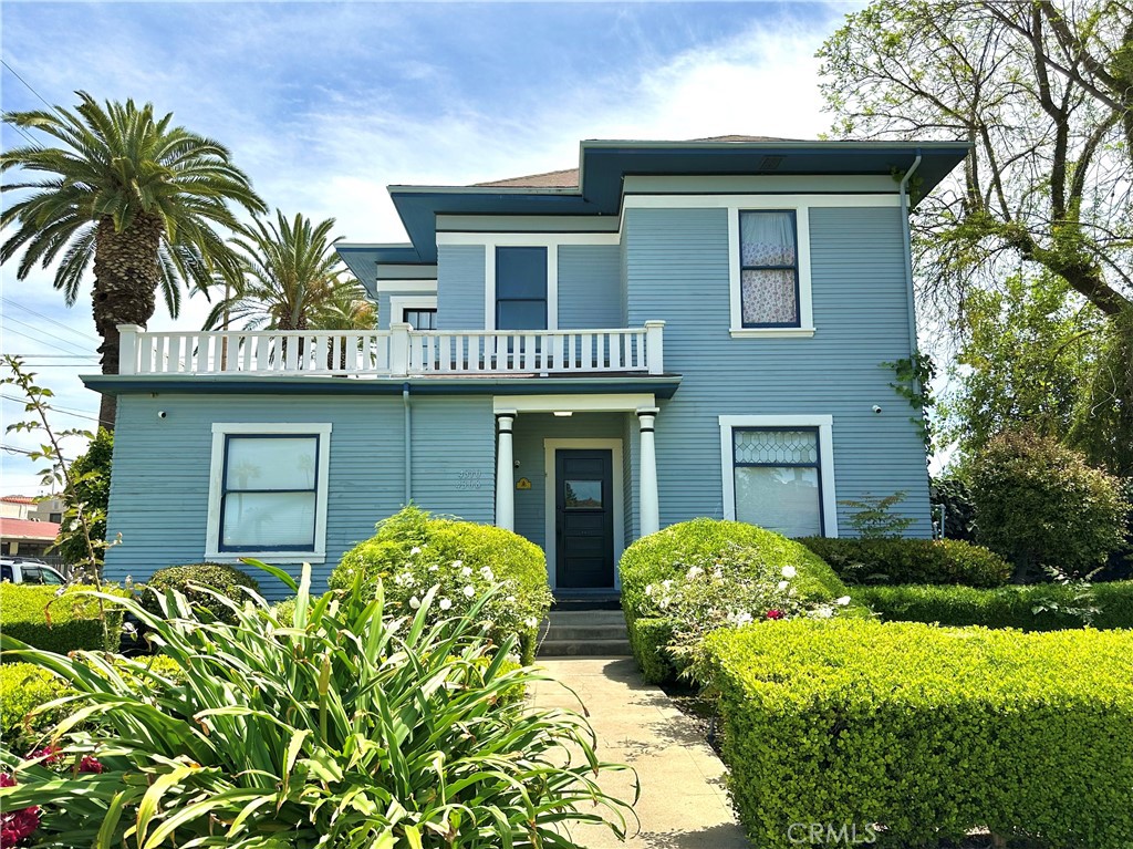 4308 Lime Street Riverside, CA 92501 - Photo 1 of 14 a front view of house with yard and outdoor seating