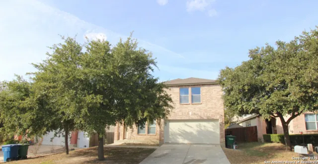 a house with trees in front of it