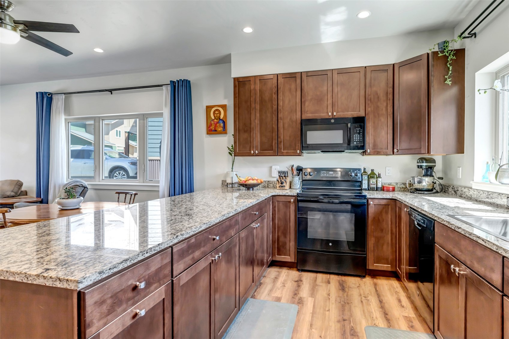 26 Ermine Road Dillon, CO 80435 - Photo 3 of 40 a kitchen with stainless steel appliances granite countertop a stove a sink and a microwave