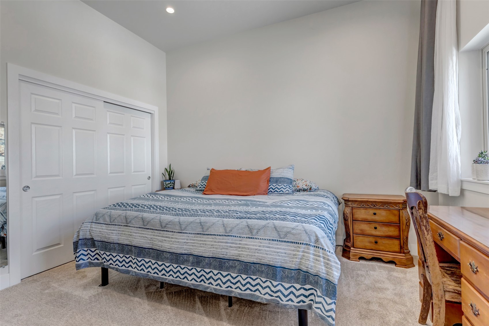 26 Ermine Road Dillon, CO 80435 - Photo 10 of 40 a bedroom with a bed and a dresser