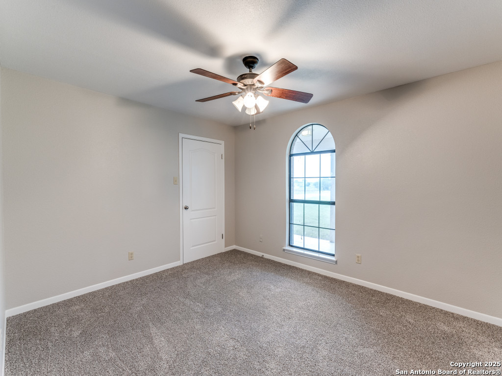 315 Simon Road Pleasanton, TX 78064 - Photo 20 of 37 a view of an empty room with a window