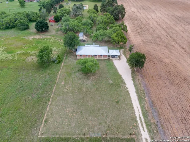 a view of a park with swings and slides