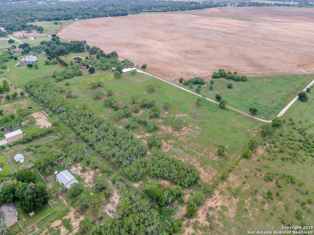 315 Simon Road Pleasanton, TX 78064 - Photo 33 of 37 a view of a green field