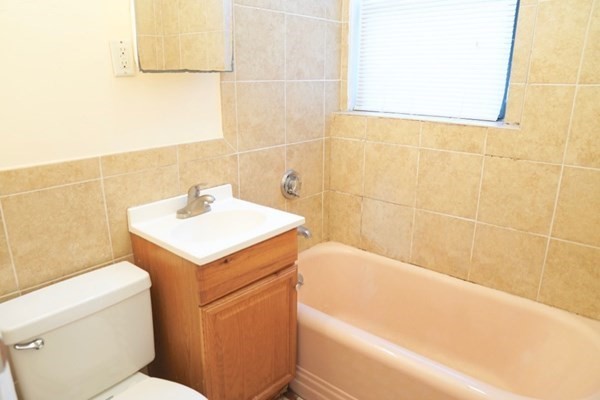 1091 Boylston Street, Unit 36 Boston, MA 02215 - Photo 7 of 7 a bathroom with a sink and a toilet
