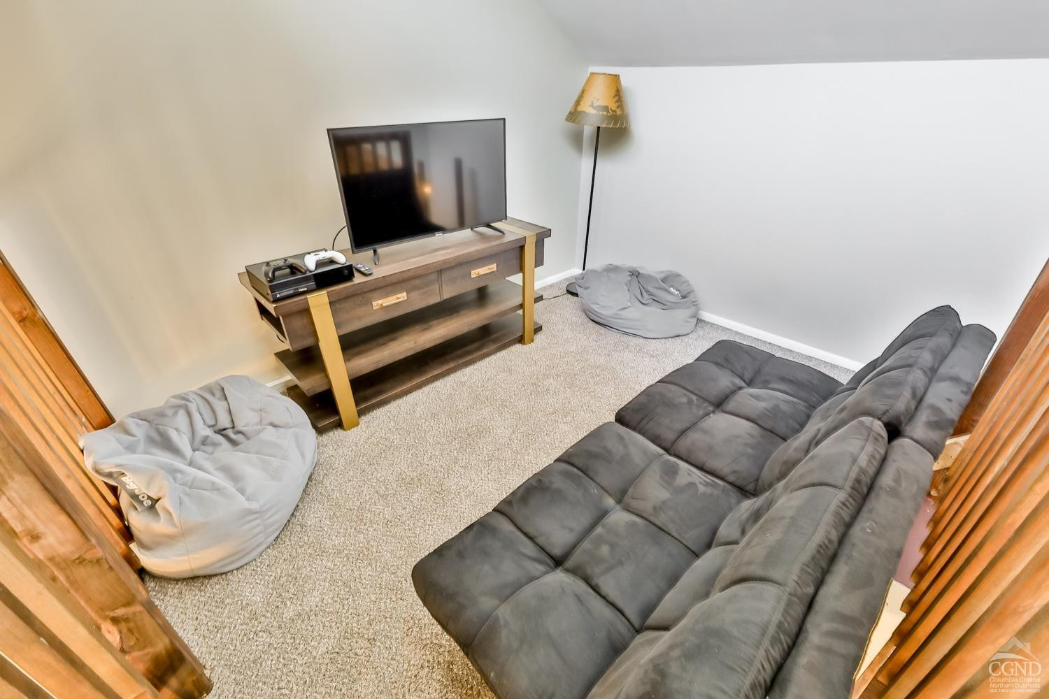 110-2 Highridge Road Windham, NY 12439 - Photo 35 of 48 a living room with furniture and flat screen tv