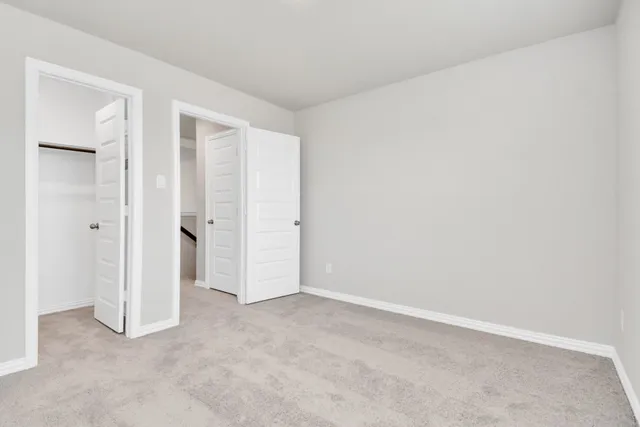 a view of storage and utility room with washer and dryer