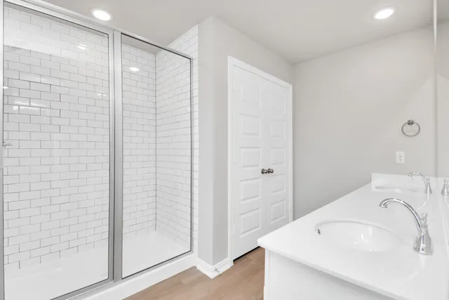 a bathroom with a sink a vanity and a mirror