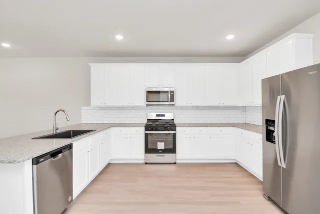 a terrace with outdoor seating and city view