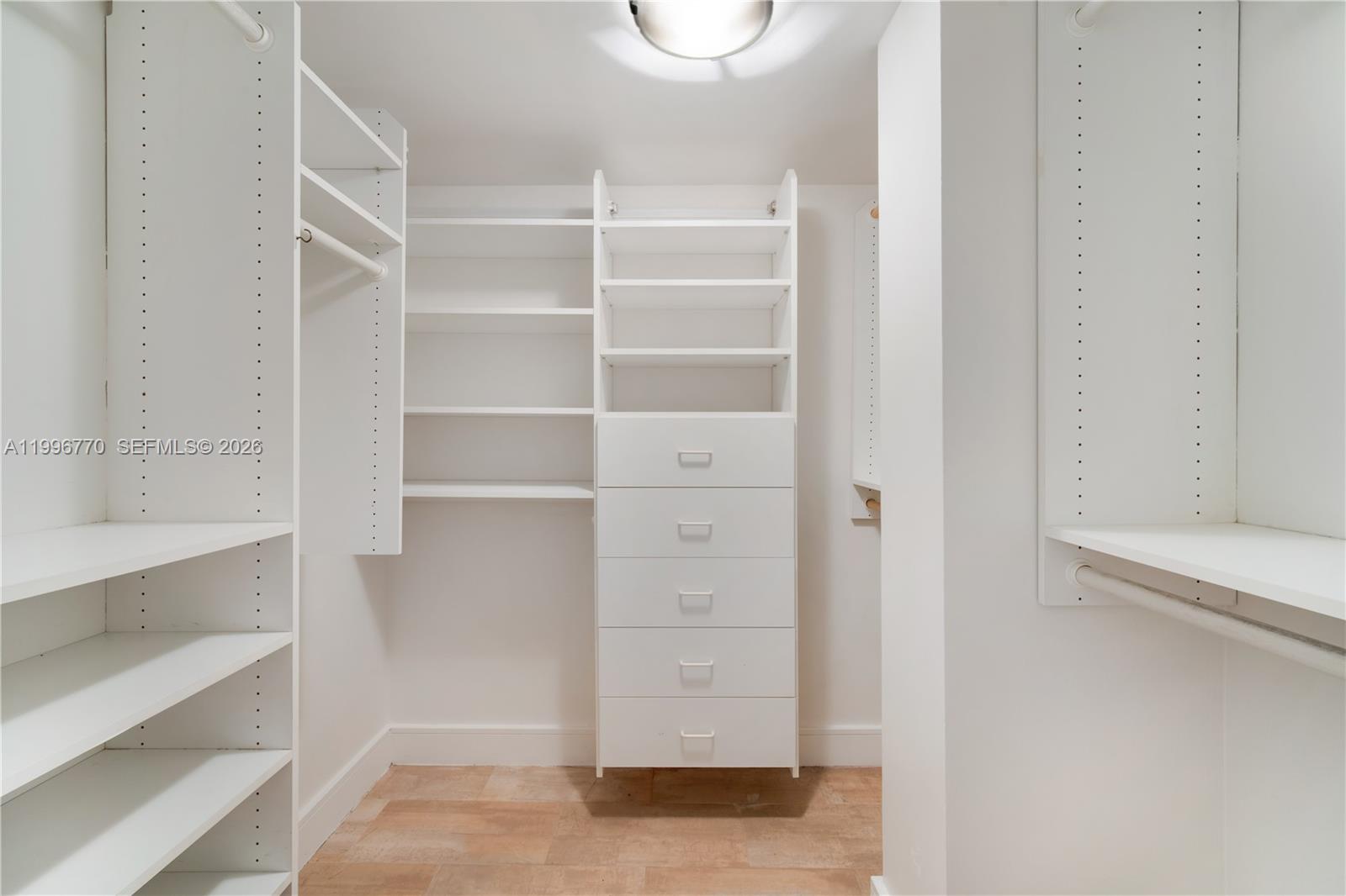 181 Crandon Boulevard, Unit 104 Key Biscayne, FL 33149 - Photo 15 of 28 a view of walk in closet