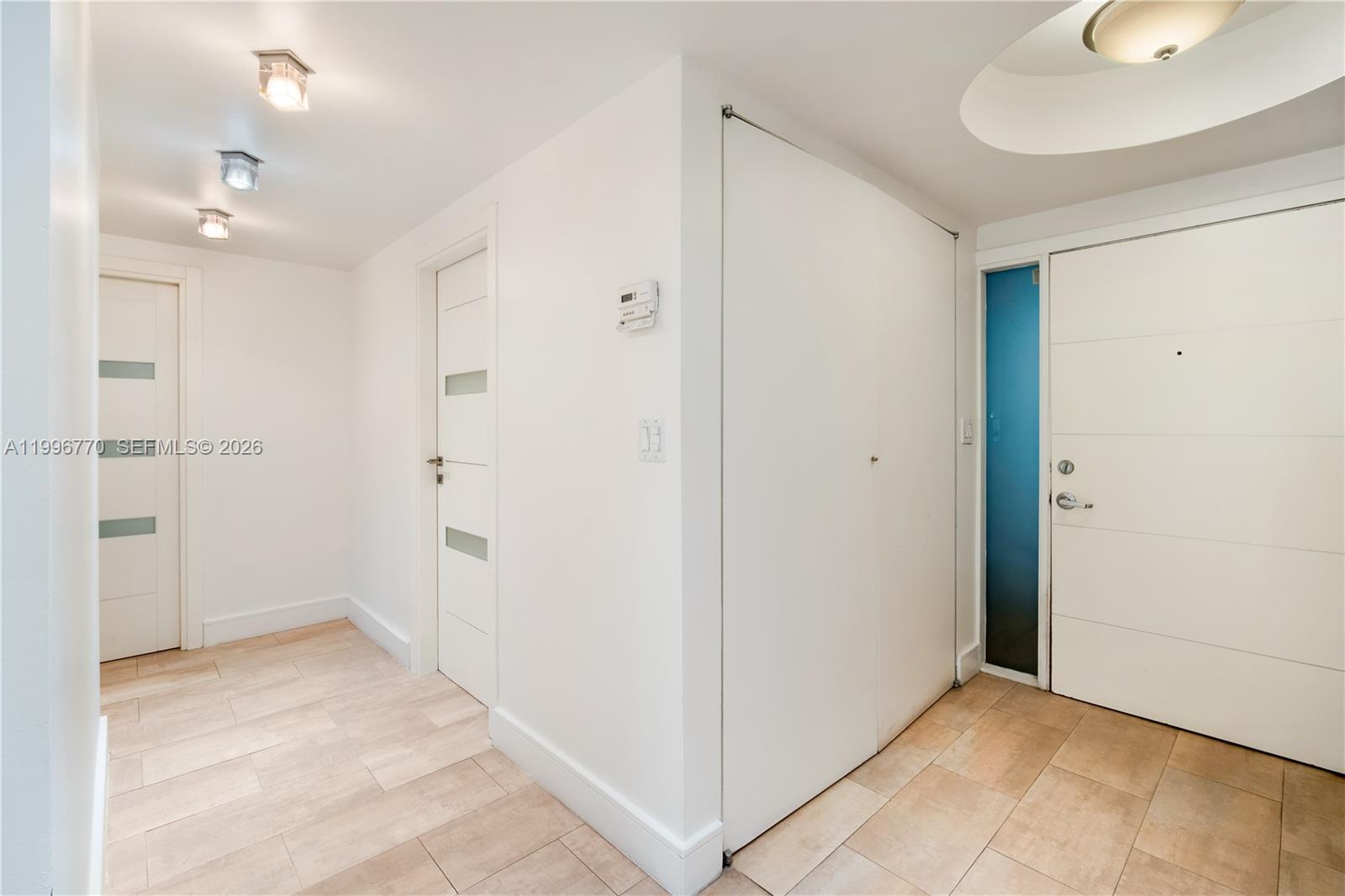 181 Crandon Boulevard, Unit 104 Key Biscayne, FL 33149 - Photo 27 of 28 a view of an empty room
