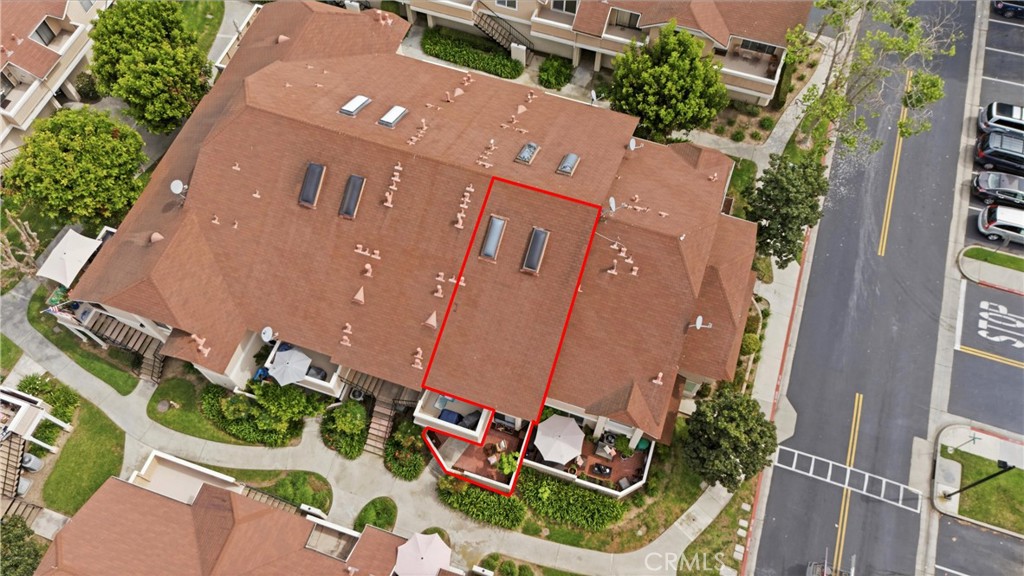 7735 Briarglen Loop, Unit I Stanton, CA 90680 - Photo 25 of 32 an aerial view of house with yard