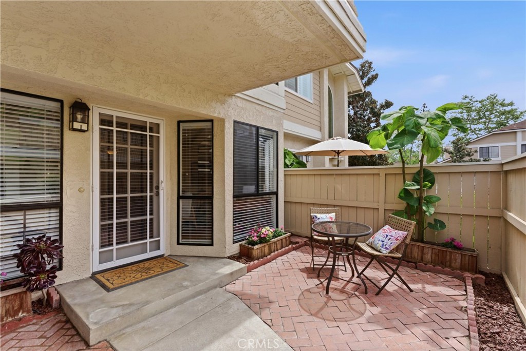 7735 Briarglen Loop, Unit I Stanton, CA 90680 - Photo 3 of 32 a house view with a sitting space