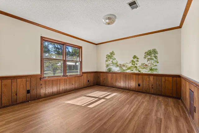 an empty room with windows