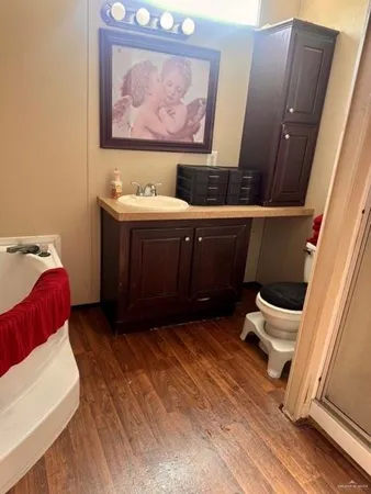 a bedroom with a bed and furniture