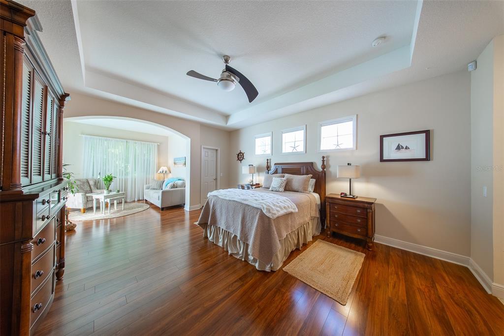 570 Crane Prairie Way Osprey, FL 34229 - Photo 17 of 39 a bed room with bed and window