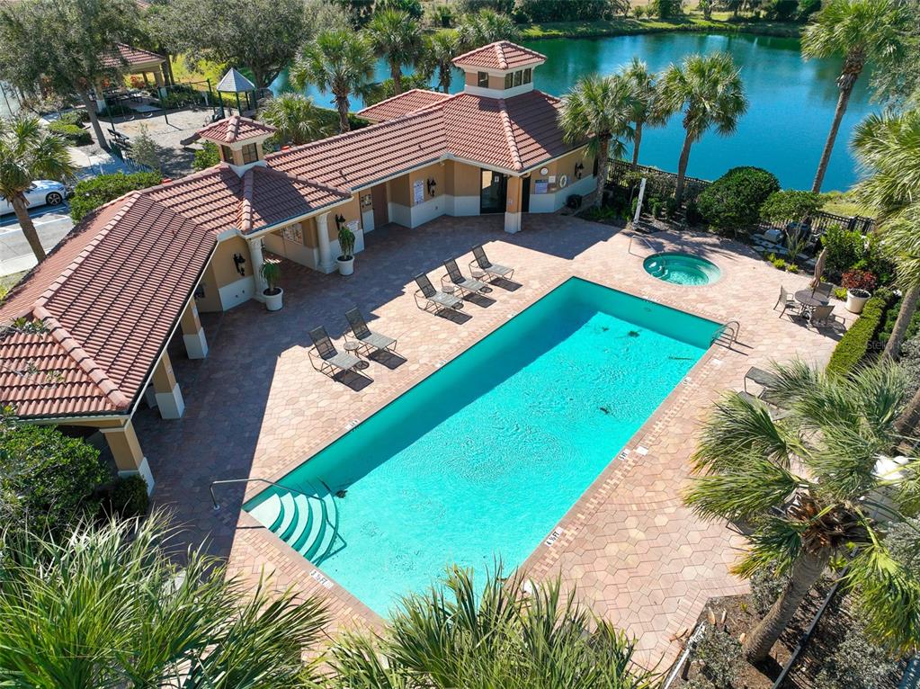570 Crane Prairie Way Osprey, FL 34229 - Photo 36 of 39 a view of a swimming pool with lounge chair