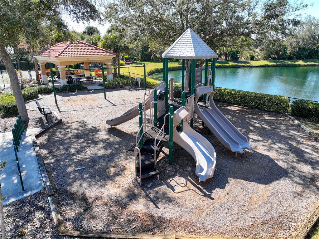 570 Crane Prairie Way Osprey, FL 34229 - Photo 38 of 39 a view of a swimming pool with a patio