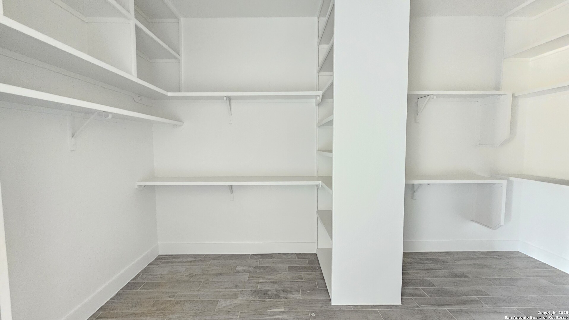 699 James Way Castroville, TX 78009 - Photo 17 of 31 a view of an empty walk in closet