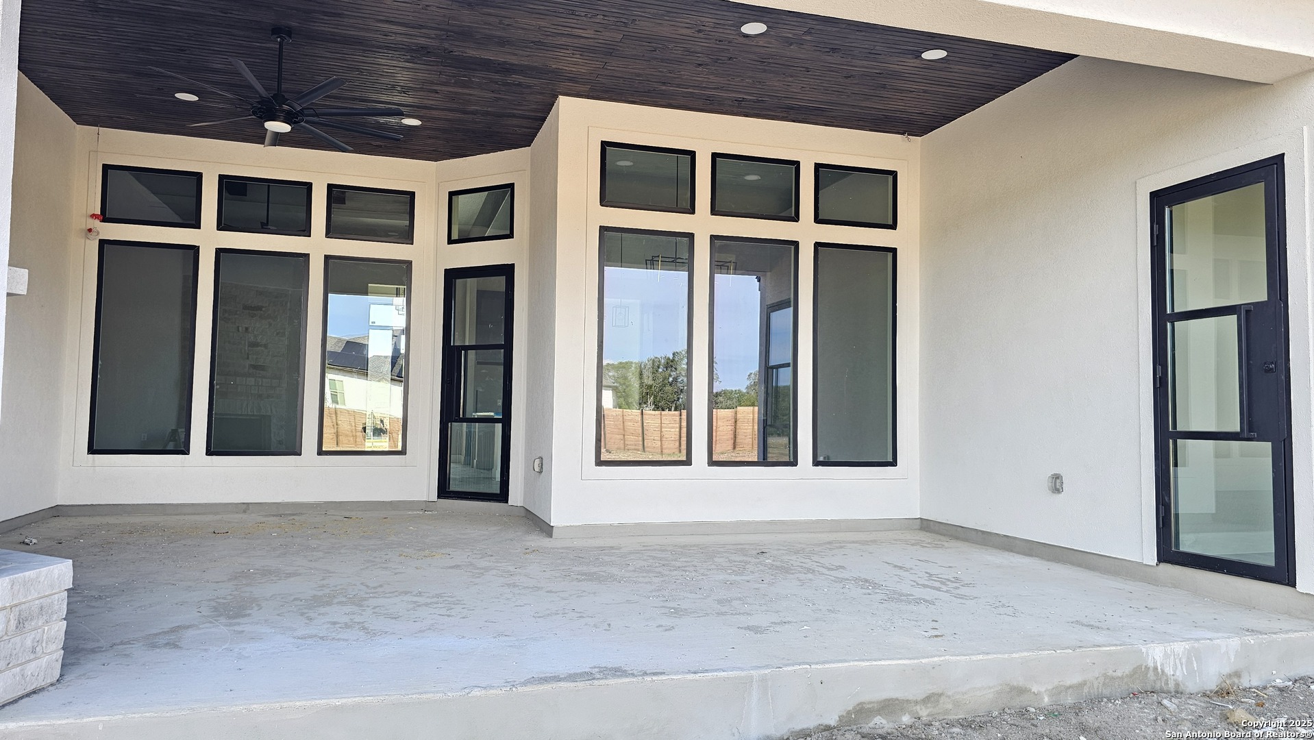 699 James Way Castroville, TX 78009 - Photo 31 of 31 a view of an entryway of a house with a window