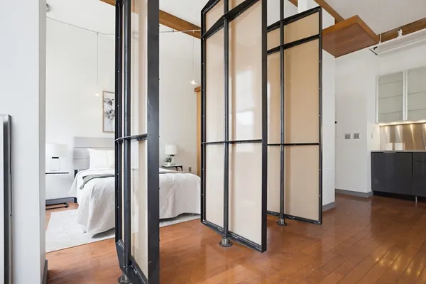 a view of a bathroom with a glass door