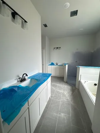 a kitchen with a sink and a stove